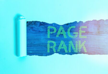 Handwriting text Page Rank. Conceptual photo a value assigned to a web page as a measure of its popularityの写真素材