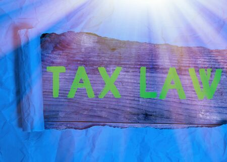 Text sign showing Tax Law. Business photo showcasing governmental assessment upon property value or transactionsの写真素材