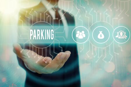 Conceptual hand writing showing Parking. Concept meaning leaving a vehicle in a particular place for a period of timeの写真素材
