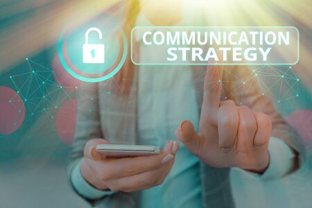 Writing note showing Communication Strategy. Business concept for Verbal Nonverbal or Visual Plans of Goal and Methodの写真素材