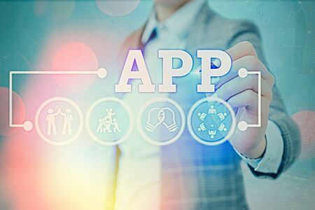Writing note showing App. Business concept for Computer program Download software by a user to a mobile deviceの写真素材