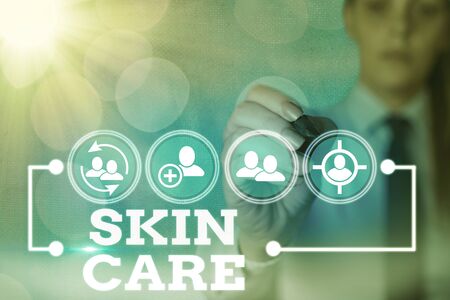 Writing note showing Skin Care. Business concept for things that you do or use to keep your skin healthy and attractiveの写真素材