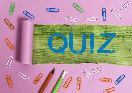 Conceptual hand writing showing Quiz. Concept meaning Brief informal test given to students Test of knowledge Examinationの写真素材