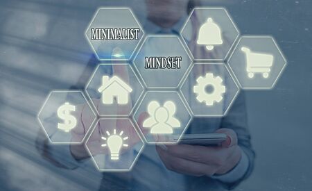 Writing note showing Minimalist Mindset. Business concept for Be more Aware what Life can Offer without Clutterの写真素材