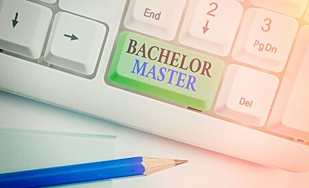 Conceptual hand writing showing Bachelor Master. Concept meaning An advanced degree completed after bachelor s is degreeの写真素材