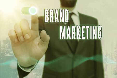 Conceptual hand writing showing Brand Marketing. Concept meaning Creating awareness about products around the worldの写真素材
