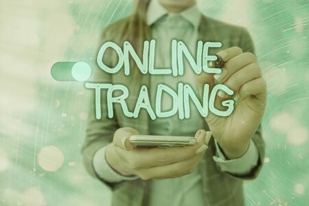 Handwriting text writing Online Trading. Conceptual photo Buying and selling assets via a brokerage internet platformの写真素材