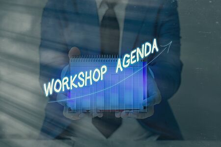 Conceptual hand writing showing Workshop Agenda. Concept meaning helps you to ensure that your place stays on scheduleの写真素材