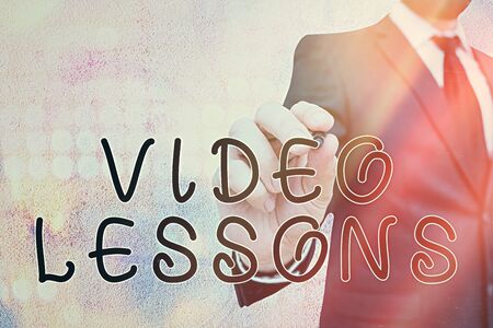Text sign showing Video Lessons. Business photo showcasing Online Education material for a topic Viewing and learningの写真素材