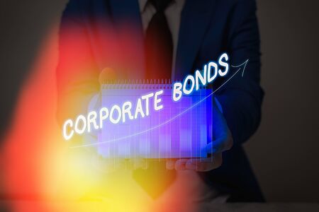 Conceptual hand writing showing Corporate Bonds. Concept meaning corporation to raise financing for variety of reasonsの写真素材