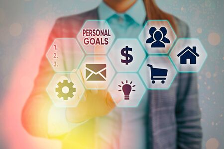 Conceptual hand writing showing Personal Goals. Concept meaning Target set by an individual to influence his efforts Motivationの写真素材
