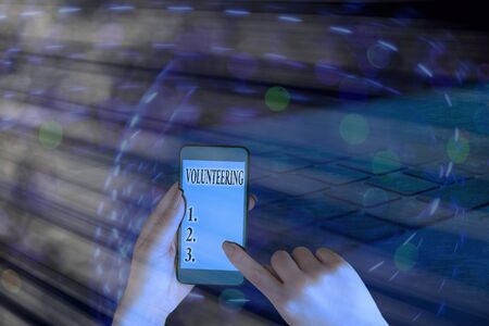 Text sign showing Volunteering. Business photo showcasing Provide services for no financial gain Willingly Obligeの写真素材