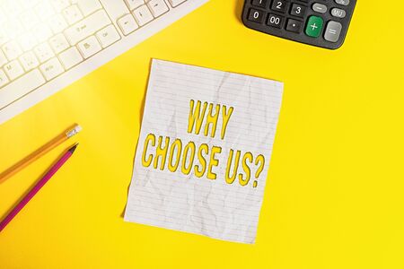 Writing note showing Why Choose Us Question. Business concept for list of advantages and disadvantages to select product service Copy space on notebook above yellow background with keyboard on tableの写真素材