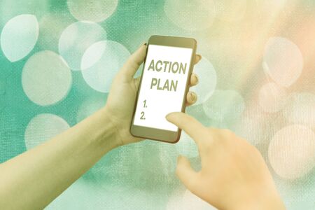 Handwriting text Action Plan. Conceptual photo proposed strategy or course of actions for certain timeの写真素材