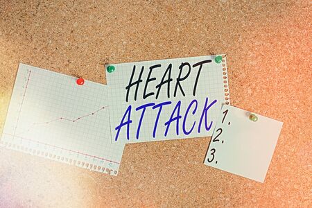 Writing note showing Heart Attack. Business concept for sudden occurrence of coronary thrombosis resulting in death Corkboard size paper thumbtack sheet billboard notice boardの写真素材