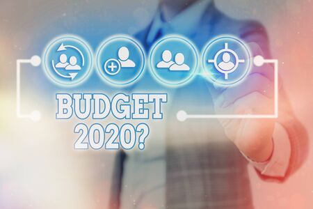 Writing note showing Budget 2020 Question. Business concept for estimate of income and expenditure for next yearの写真素材