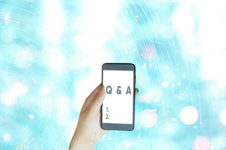 Conceptual hand writing showing Q And A. Concept meaning defined as questions being asked and answersの写真素材
