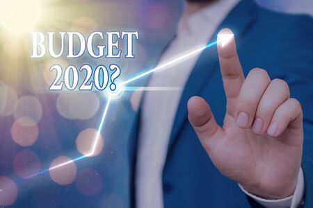 Writing note showing Budget 2020 Question. Business concept for estimate of income and expenditure for next yearの写真素材