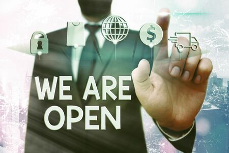 Conceptual hand writing showing We Are Open. Concept meaning no enclosing or confining barrier,...