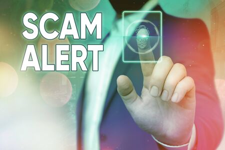 Handwriting text Scam Alert. Conceptual photo fraudulently obtain money from victim by persuading himの写真素材