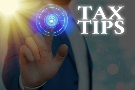 Text sign showing Tax Tips. Business photo text compulsory contribution to state revenue levied by governmentの写真素材