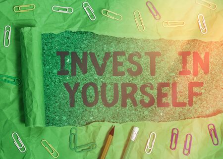 Handwriting text writing Invest In Yourself. Conceptual photo learn new things or materials thus making your lot betterの写真素材