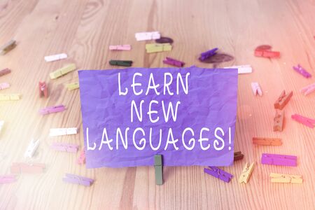 Writing note showing Learn New Languages. Business concept for developing ability to communicate in foreign langの写真素材