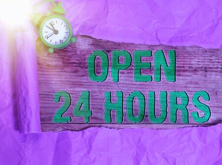 Conceptual hand writing showing Open 24 Hours. Concept meaning available all day and all night without closing or stoppingの写真素材