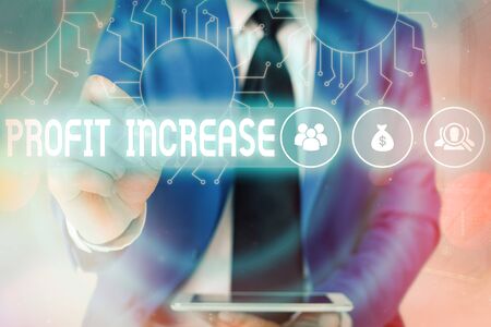 Word writing text Profit Increase. Business photo showcasing the growth in the amount of revenue gained from a businessの写真素材
