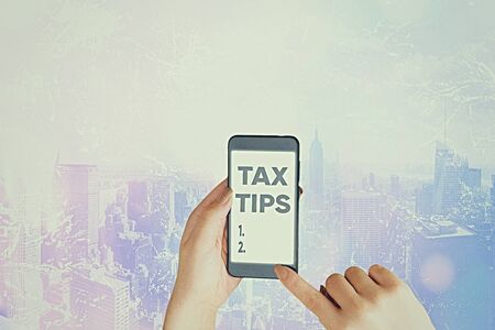 Word writing text Tax Tips. Business photo showcasing compulsory contribution to state revenue...