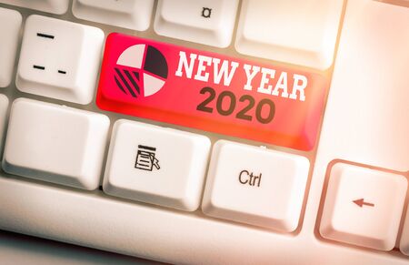 Writing note showing New Year 2020. Business concept for Greeting Celebrating Holiday Fresh Start Best wishesの写真素材