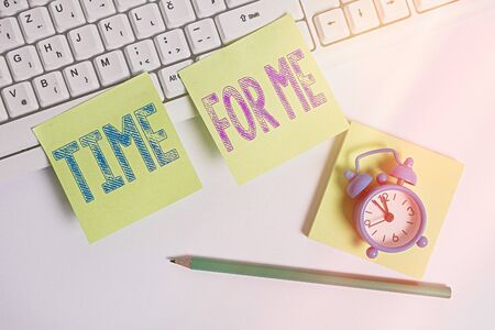 Writing note showing Time For Me. Business concept for practice of taking action preserve or improve ones own health Square note paper and paper clips with pencil on the white backgroundの写真素材