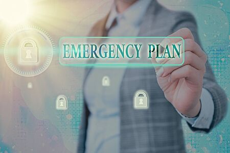 Conceptual hand writing showing Emergency Plan. Concept meaning instructions that outlines what workers should do in dangerの写真素材