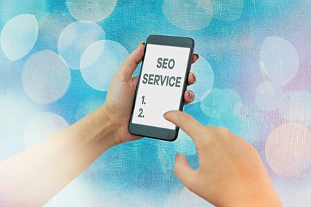 Handwriting text Seo Service. Conceptual photo techniques and procedures to increase the website visibilityの写真素材