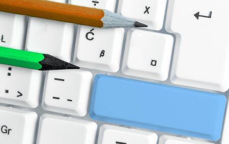 Pc Keyboard Key With Empty Note Paper Above Copy Spaceの写真素材