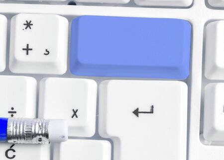 Pc Keyboard Key With Empty Note Paper Above Copy Spaceの写真素材