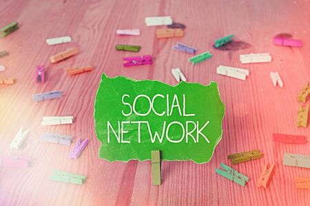 Writing note showing Social Network. Business concept for a framework of individual linked by interan individualal relationshipの写真素材