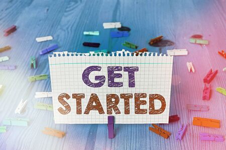 Writing note showing Get Started. Business concept for to begin accomplishing or working on the tasks to finish itの写真素材