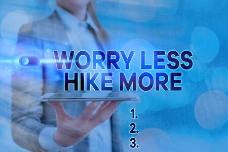 Text sign showing Worry Less Hike More. Business photo showcasing Leisure activity Relaxation Exercise Recreationの写真素材