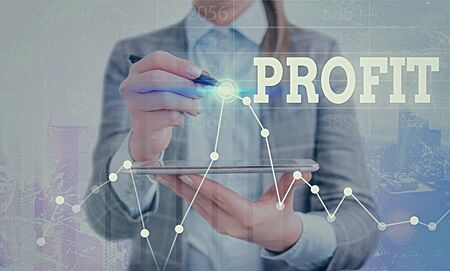 Conceptual hand writing showing Profit. Concept meaning the difference between the amount earned and the amount spentの写真素材