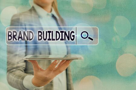 Text sign showing Brand Building. Business photo text boosting customer s is knowledge over a certain businessの写真素材