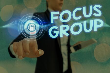 Writing note showing Focus Group. Business concept for consist of carefullyselected participants to provide feedbackの写真素材
