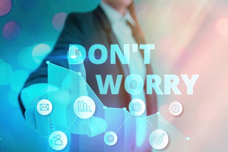 Conceptual hand writing showing Do not dont Worry. Concept meaning indicates to be less nervous and have no fear about somethingの写真素材