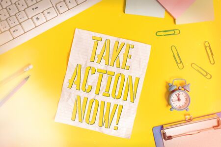Conceptual hand writing showing Take Action Now. Concept meaning Do it now Response Immediately Something need to be done urgently Flat lay above copy space on the white crumpled paperの写真素材