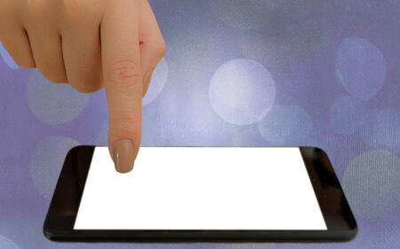 Modern Gadgets With White Display Screen Under Colorful Bokeh Backgroundの写真素材