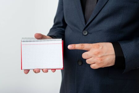 Model Displaying Different Empty Color Notepad Mock-Up For Writing Ideaの写真素材