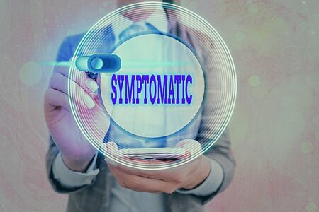 Handwriting text writing Symptomatic. Conceptual photo serving as symptom or sign especially of...