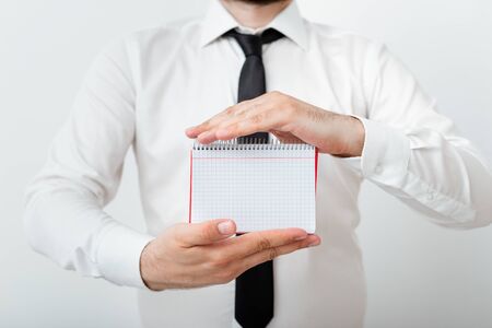 Model Displaying Different Empty Color Notepad Mock-Up For Writing Ideaの写真素材