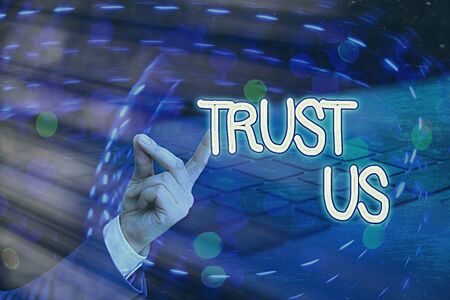 Conceptual hand writing showing Trust Us. Concept meaning believing in the integrity and honesty of a larger scale of populationの写真素材
