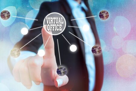 Conceptual hand writing showing Virtual Office. Concept meaning operational domain of any business or organization virtually Solar system image.の写真素材